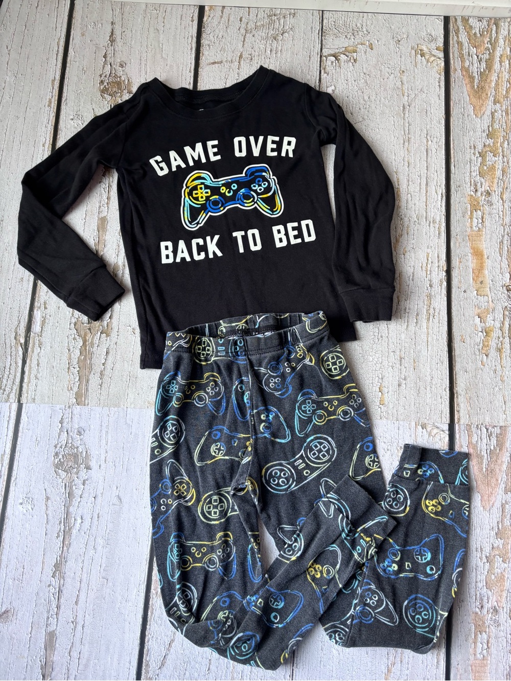 Place Black 'Game Over Back to Bed' Pajama Set with Colorful Controller Print